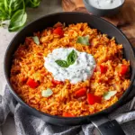 Paprika-Reis-Pfanne mit Joghurtsoße - schnell & vegetarisch